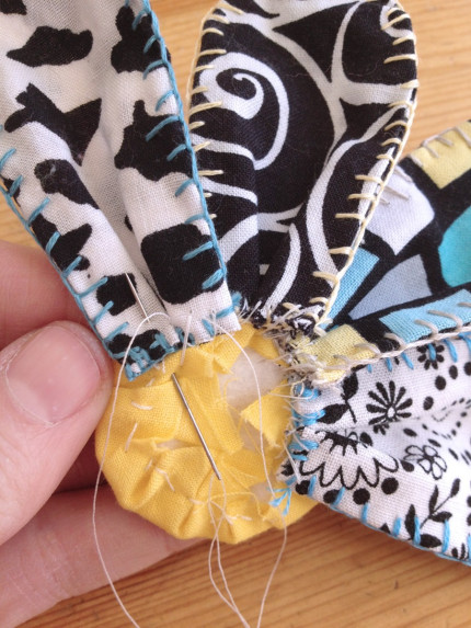 Stitching Fabric Flower Petals To Center
